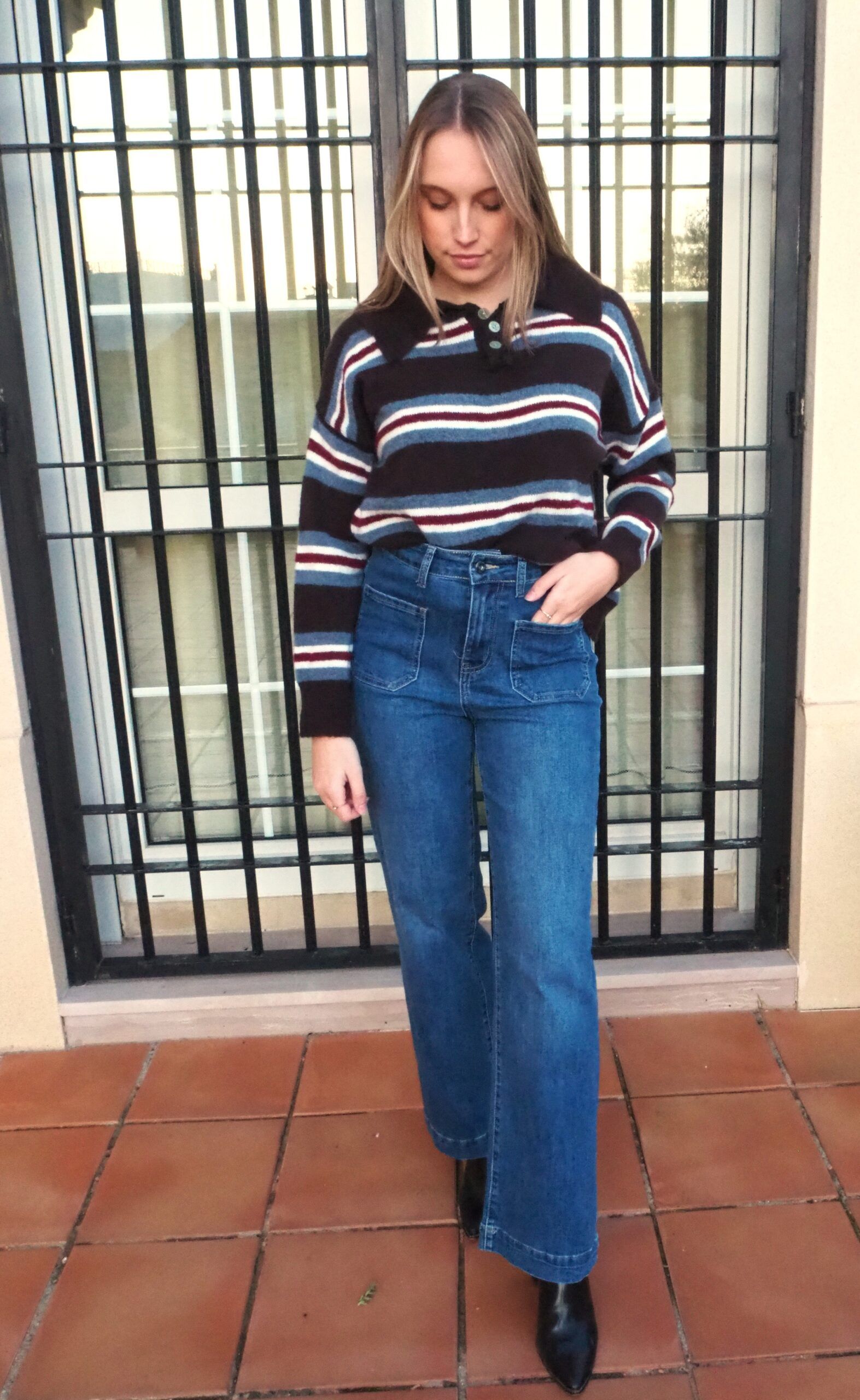 Jersey polo abotonado de rayas mujer